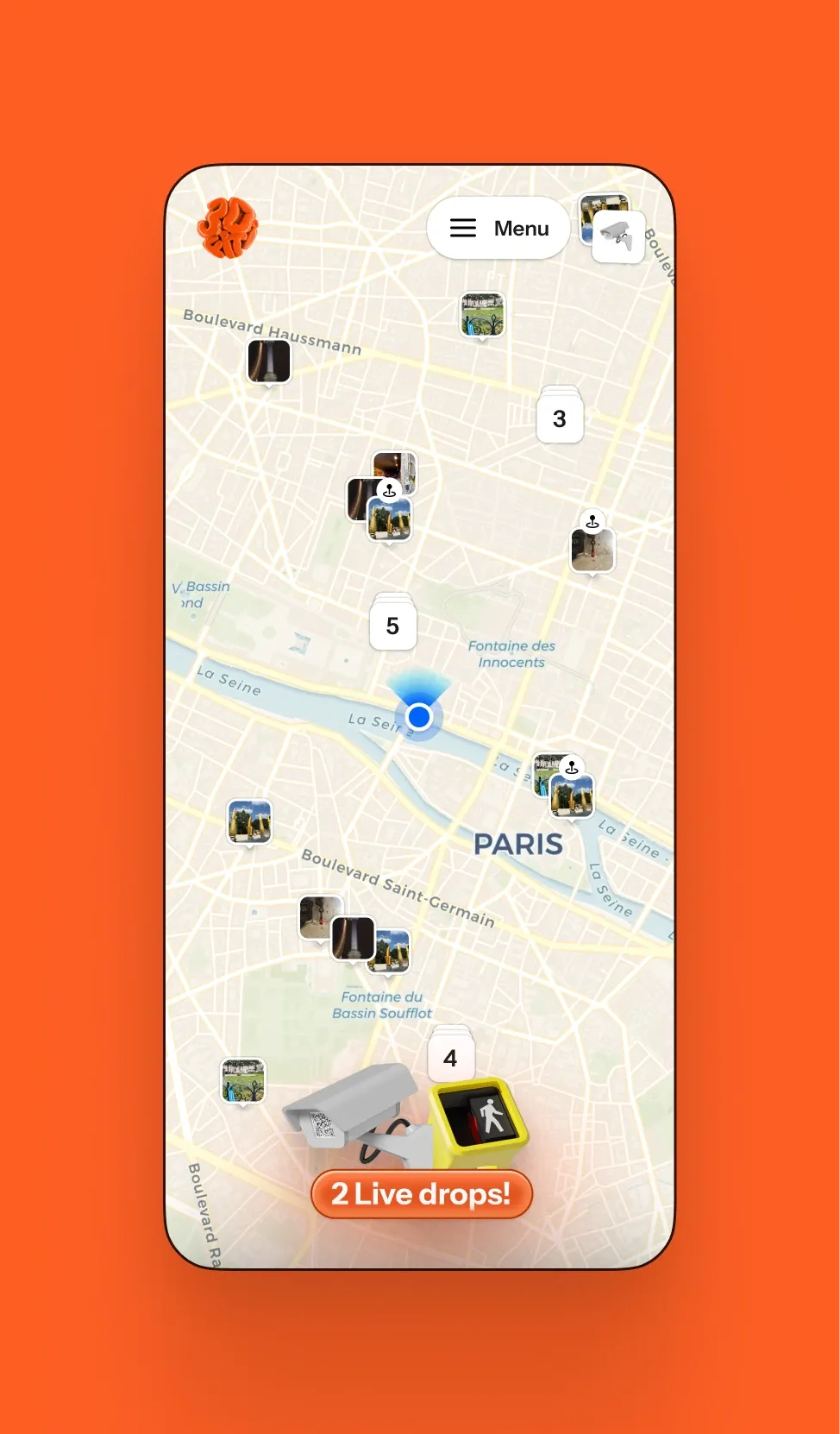 Paris as the game board. Past drops sit on the map where they were found, and a banner announces the two drops live right now, a surveillance camera and a pedestrian light ring.